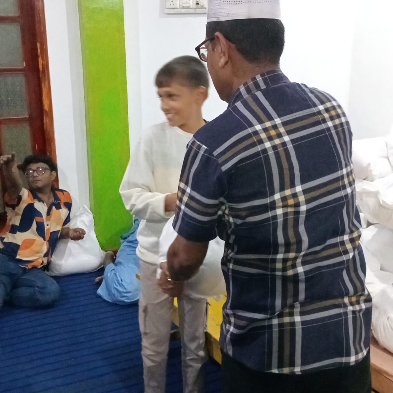 Food pack distribution to a young community member