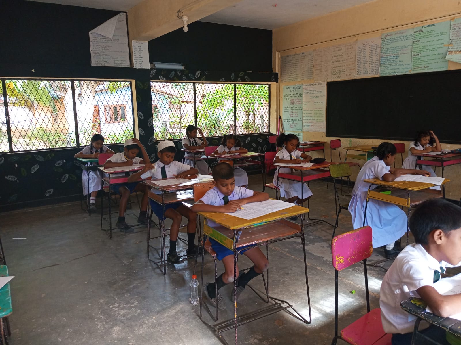 Students completing classroom exercises