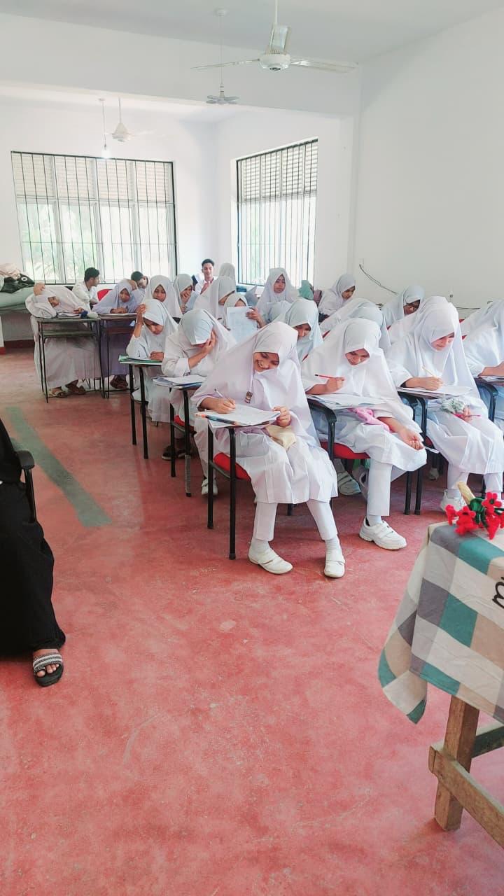 Students writing during the Tamil seminar